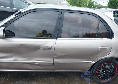 1999 Toyota Corolla Le из США, поврежденный, VIN 2T1BR12E9XC204275